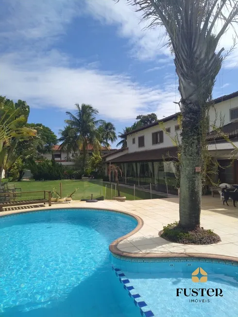 Foto 1 de Casa de Condomínio com 6 Quartos à venda, 1600m² em Barra da Tijuca, Rio de Janeiro