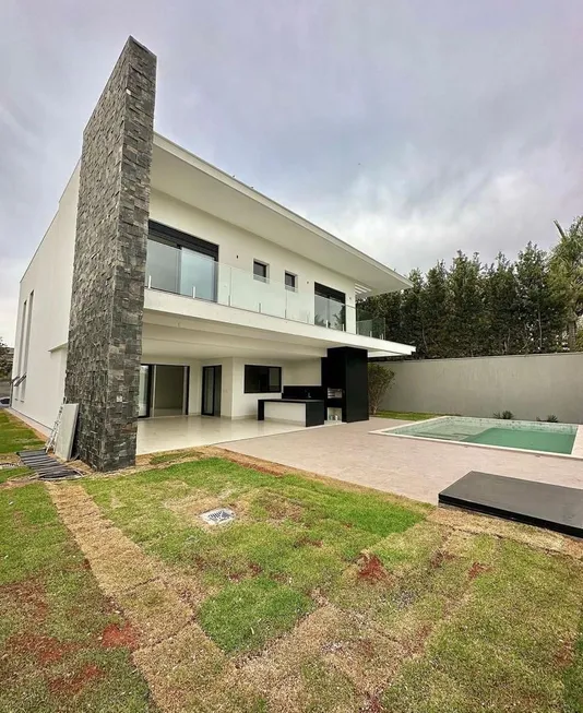 Foto 1 de Casa de Condomínio com 4 Quartos à venda, 651m² em Residencial Alphaville Flamboyant, Goiânia