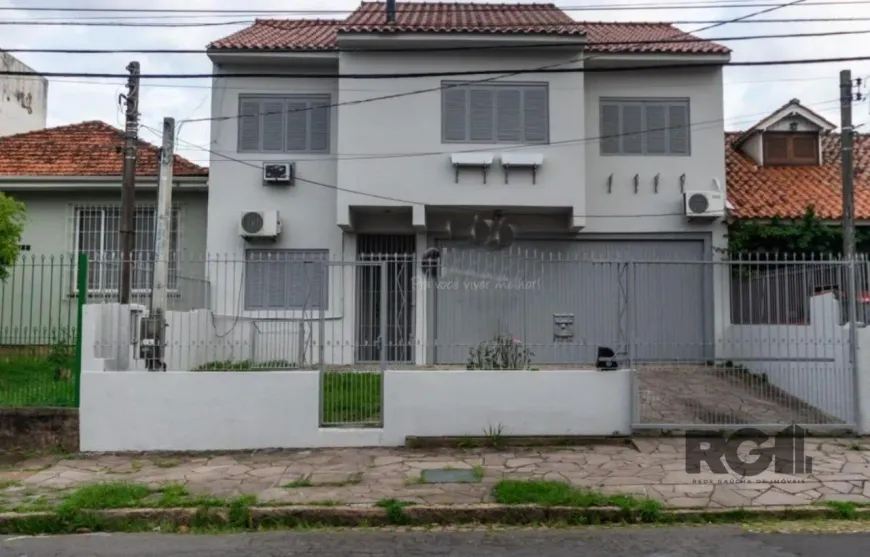 Foto 1 de Casa com 5 Quartos à venda, 301m² em Cristo Redentor, Porto Alegre