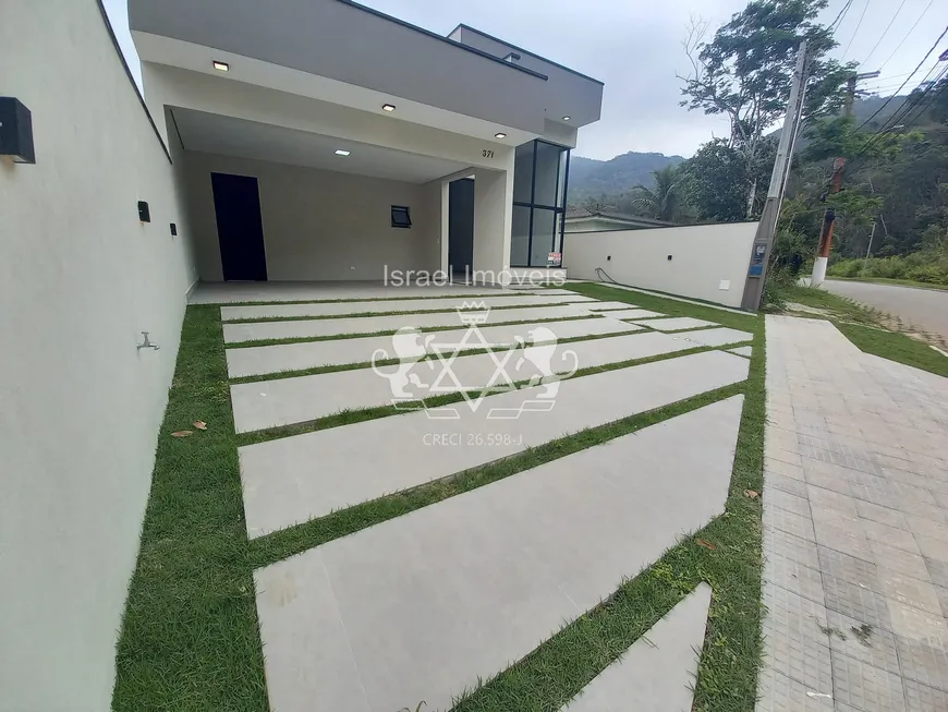 Foto 1 de Casa de Condomínio com 4 Quartos à venda, 223m² em Mar Verde, Caraguatatuba