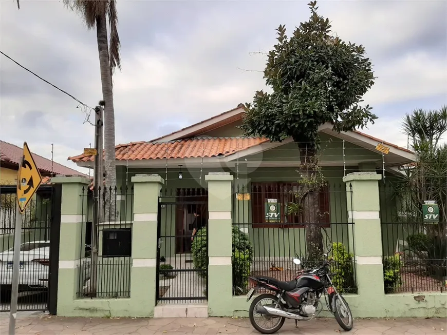 Foto 1 de Casa com 2 Quartos à venda, 338m² em Vila Ipiranga, Porto Alegre