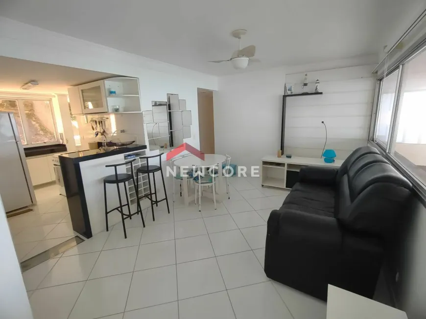 Foto 1 de Apartamento com 2 Quartos à venda, 65m² em Pitangueiras, Guarujá