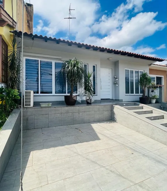 Foto 1 de Casa de Condomínio com 3 Quartos à venda, 135m² em Hípica, Porto Alegre