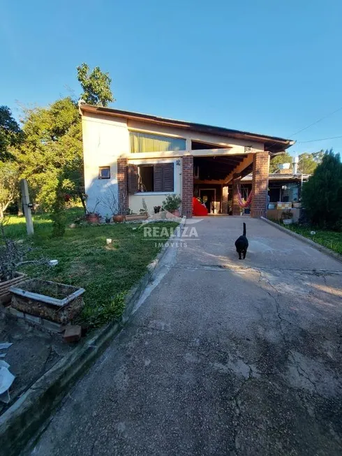 Foto 1 de Casa com 3 Quartos à venda, 150m² em Tarumã, Viamão
