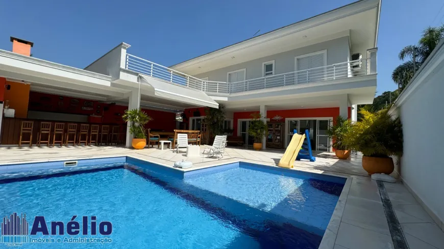 Foto 1 de Casa de Condomínio com 5 Quartos à venda, 380m² em Balneário Praia do Pernambuco, Guarujá