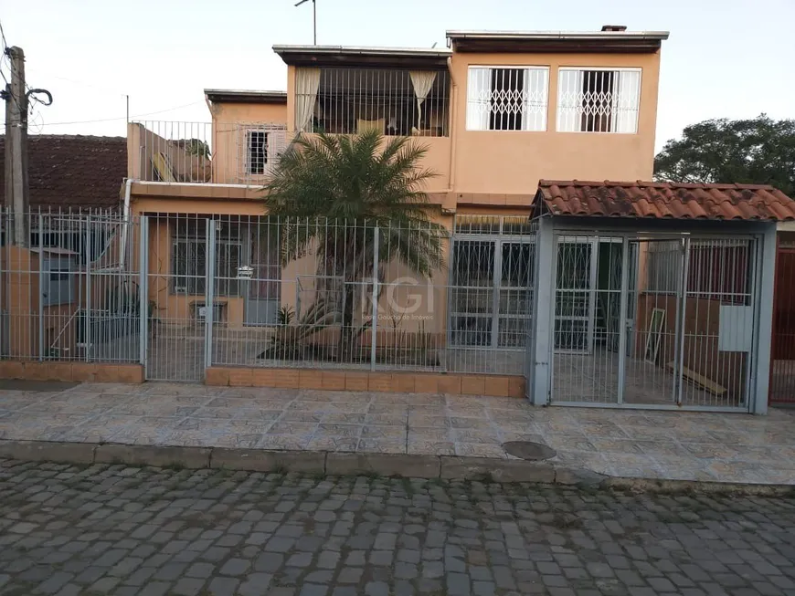 Foto 1 de Sobrado com 4 Quartos à venda, 229m² em Restinga, Porto Alegre