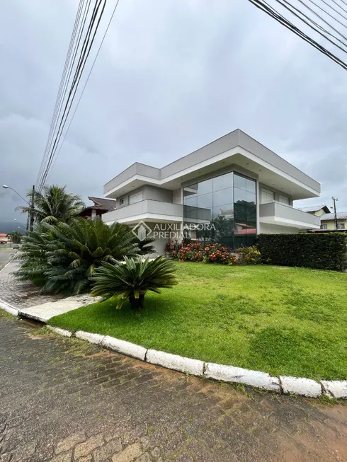 Foto 1 de Casa de Condomínio com 4 Quartos à venda, 374m² em Cacupé, Florianópolis
