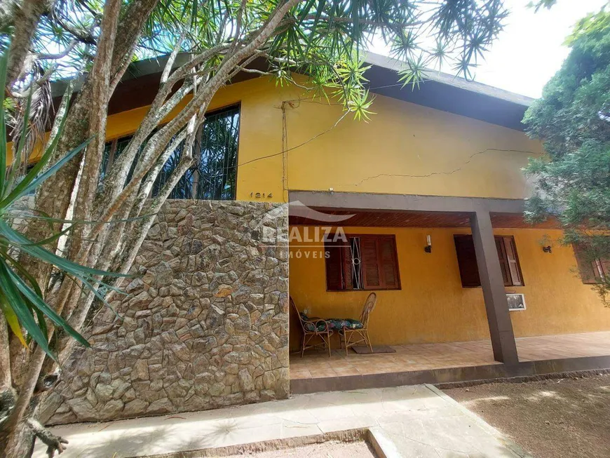 Foto 1 de Casa com 5 Quartos à venda, 252m² em Tarumã, Viamão