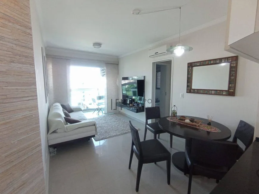 Foto 1 de Apartamento com 2 Quartos para alugar, 75m² em Enseada, Guarujá