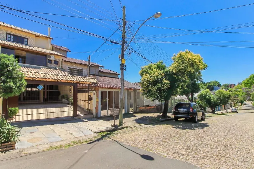 Foto 1 de Casa com 3 Quartos à venda, 198m² em Cavalhada, Porto Alegre