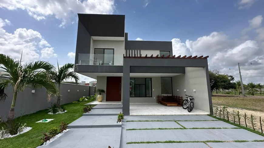Foto 1 de Casa de Condomínio com 4 Quartos à venda, 238m² em Jacunda, Aquiraz