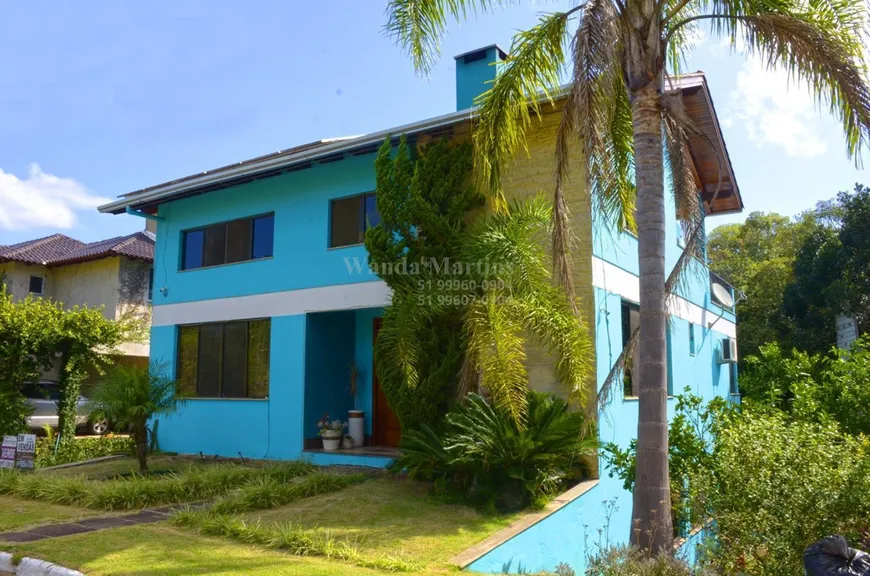 Foto 1 de Casa de Condomínio com 3 Quartos à venda, 345m² em Condomínio Condado de Castella, Viamão