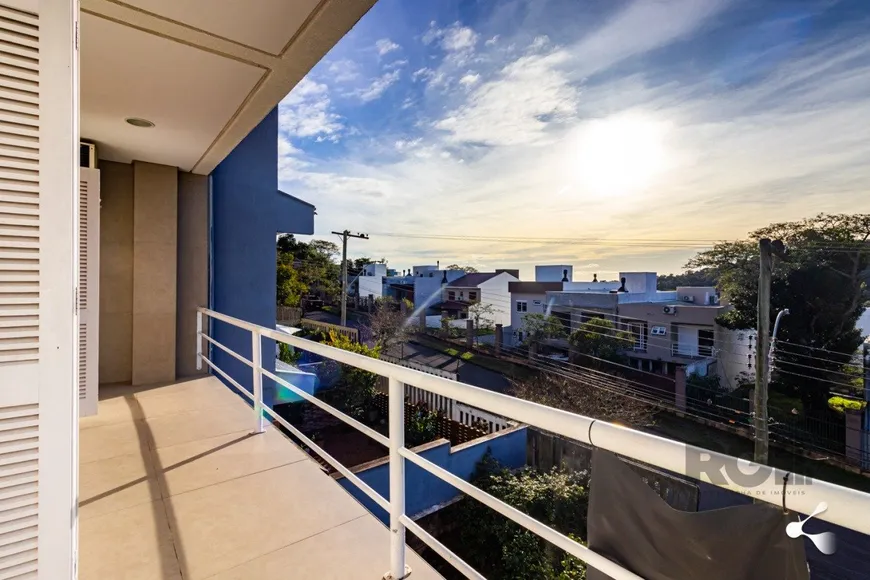 Foto 1 de Casa de Condomínio com 3 Quartos à venda, 204m² em Vila Nova, Porto Alegre