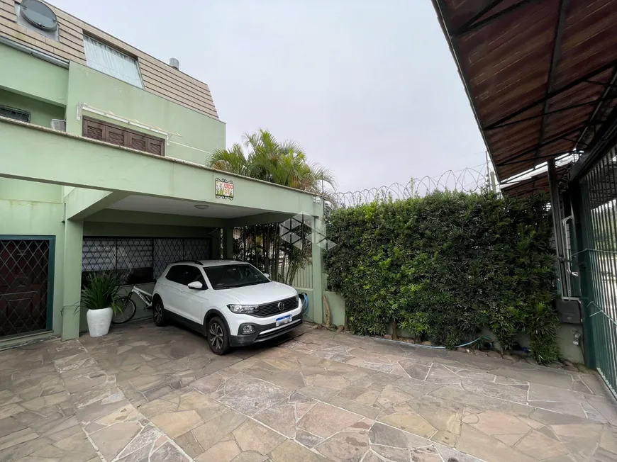 Foto 1 de Casa com 4 Quartos à venda, 209m² em Tristeza, Porto Alegre