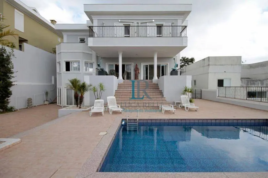 Foto 1 de Casa de Condomínio com 6 Quartos para venda ou aluguel, 980m² em Alphaville, Santana de Parnaíba