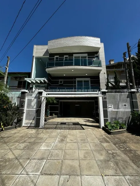 Foto 1 de Casa com 4 Quartos à venda, 341m² em Jardim Leopoldina, Porto Alegre