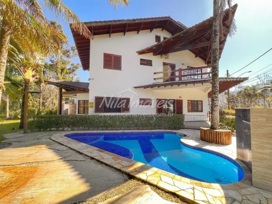 Foto 1 de Casa de Condomínio com 4 Quartos à venda, 274m² em Loteamento Costa do Sol, Bertioga
