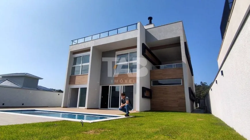 Foto 1 de Casa de Condomínio com 4 Quartos à venda, 407m² em Santa Regina, Camboriú