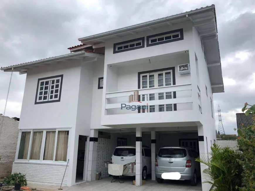 Foto 1 de Casa com 4 Quartos à venda, 360m² em Caminho Novo, Palhoça