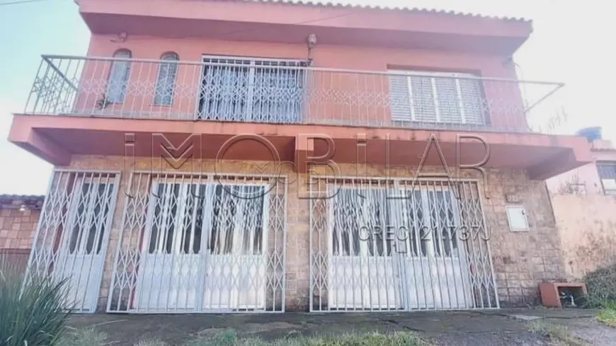 Foto 1 de Casa com 2 Quartos à venda, 163m² em Centro, Bagé