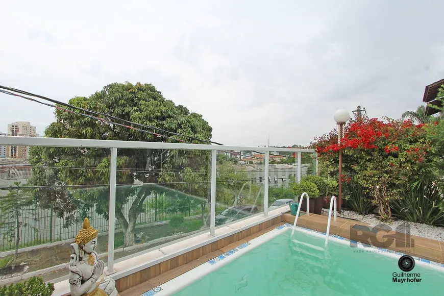 Foto 1 de Casa com 4 Quartos à venda, 299m² em Medianeira, Porto Alegre