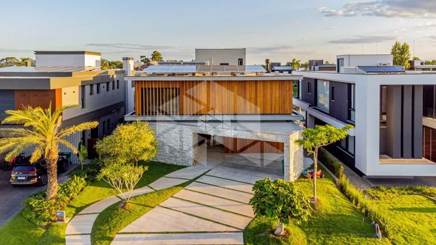 Foto 1 de Casa de Condomínio com 5 Quartos para alugar, 478m² em Centro Novo, Eldorado do Sul