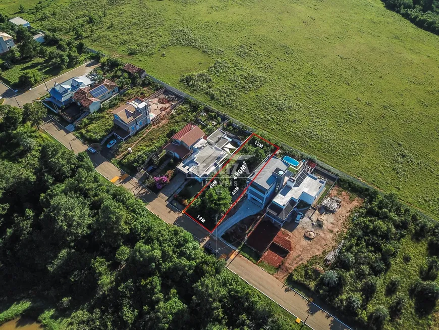 Foto 1 de Lote/Terreno à venda, 480m² em Condominio Cantegril, Viamão