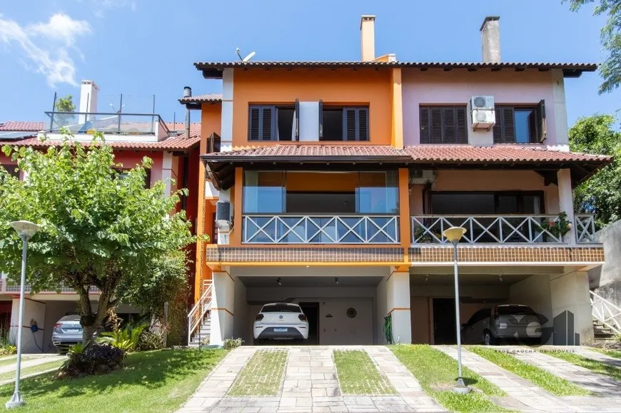 Foto 1 de Casa de Condomínio com 3 Quartos à venda, 274m² em Tristeza, Porto Alegre