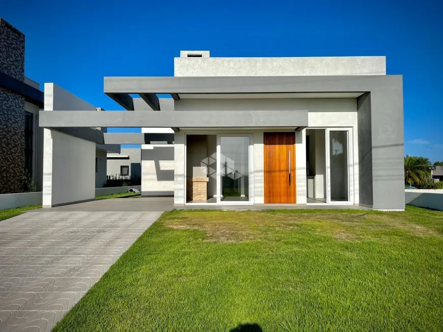 Foto 1 de Casa de Condomínio com 3 Quartos à venda, 150m² em Araca, Capão da Canoa