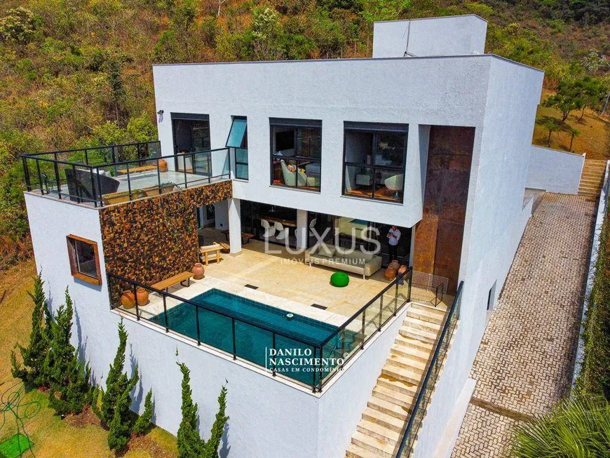 Foto 1 de Casa de Condomínio com 4 Quartos à venda, 450m² em Vila  Alpina, Nova Lima
