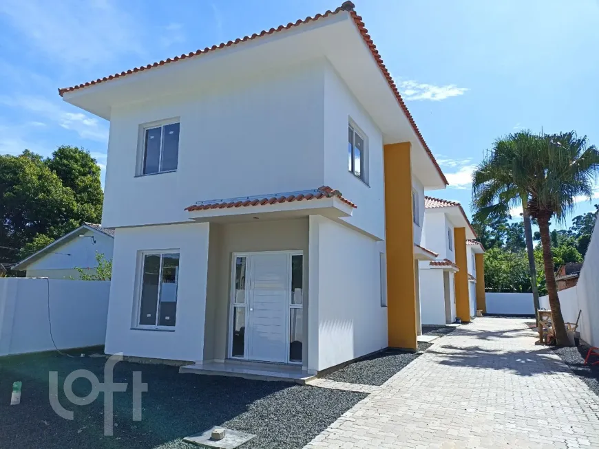 Foto 1 de Casa com 2 Quartos à venda, 69m² em Guajuviras, Canoas