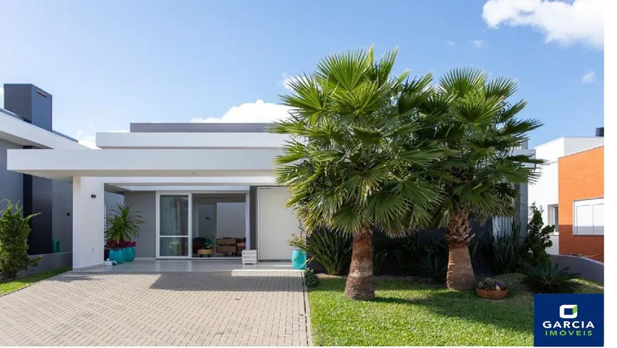 Foto 1 de Casa de Condomínio com 4 Quartos à venda, 170m² em Zona Nova, Capão da Canoa