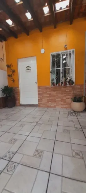 Foto 1 de Sobrado com 3 Quartos à venda, 96m² em Aberta dos Morros, Porto Alegre