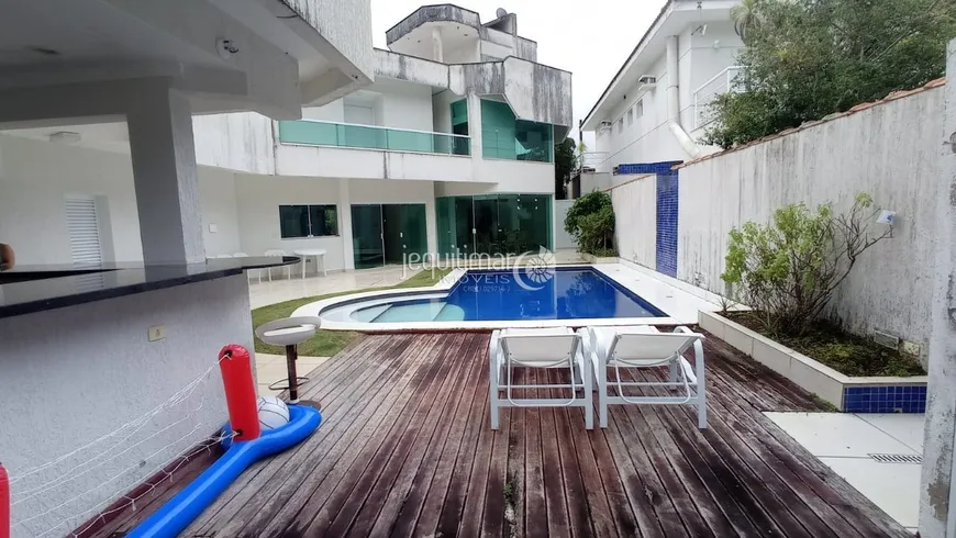 Foto 1 de Casa de Condomínio com 5 Quartos à venda, 580m² em Balneário Praia do Pernambuco, Guarujá