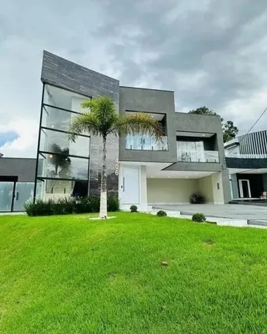 Foto 1 de Casa de Condomínio com 4 Quartos à venda, 390m² em Ponta Negra, Manaus