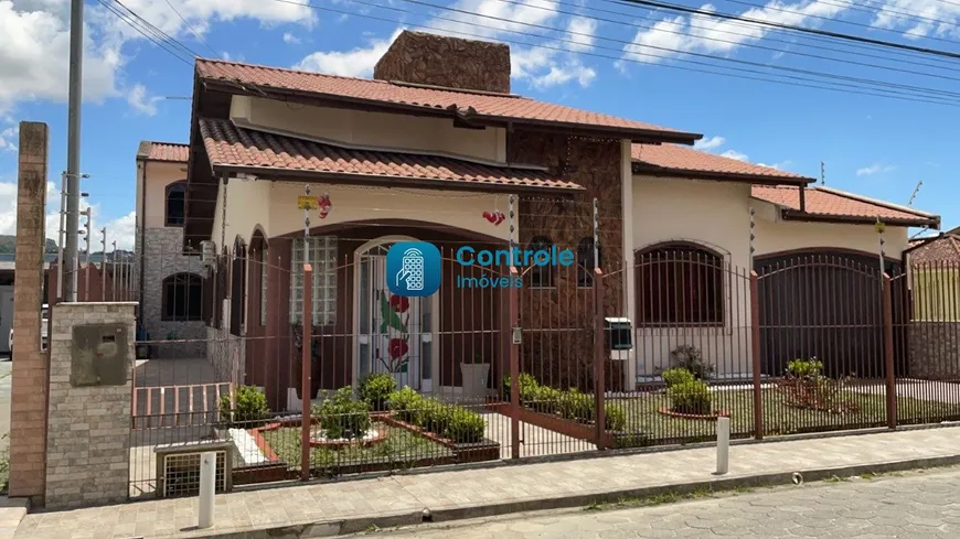 Foto 1 de Casa com 4 Quartos à venda, 310m² em Fundos, Biguaçu