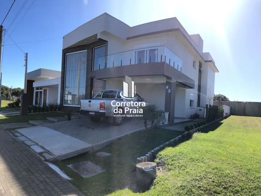 Foto 1 de Casa de Condomínio com 4 Quartos à venda, 260m² em Emboaba, Tramandaí