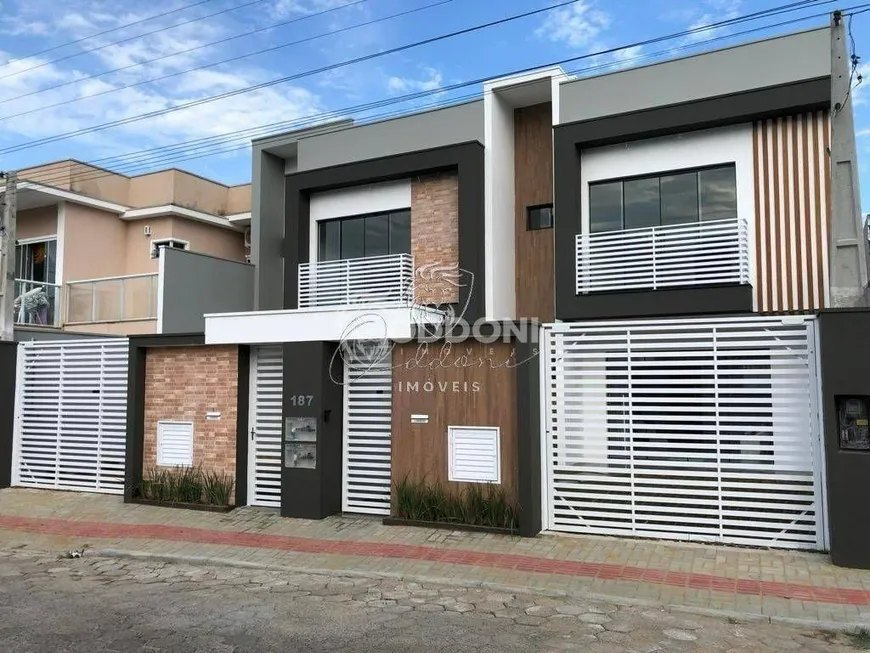 Foto 1 de Sobrado com 3 Quartos à venda, 124m² em Centro, Penha