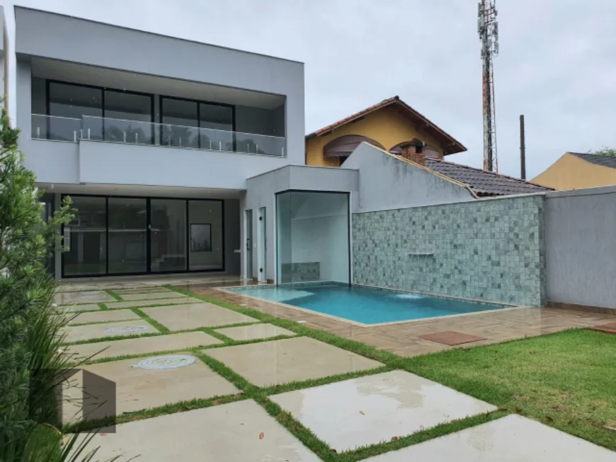 Foto 1 de Casa de Condomínio com 4 Quartos à venda, 371m² em Barra da Tijuca, Rio de Janeiro