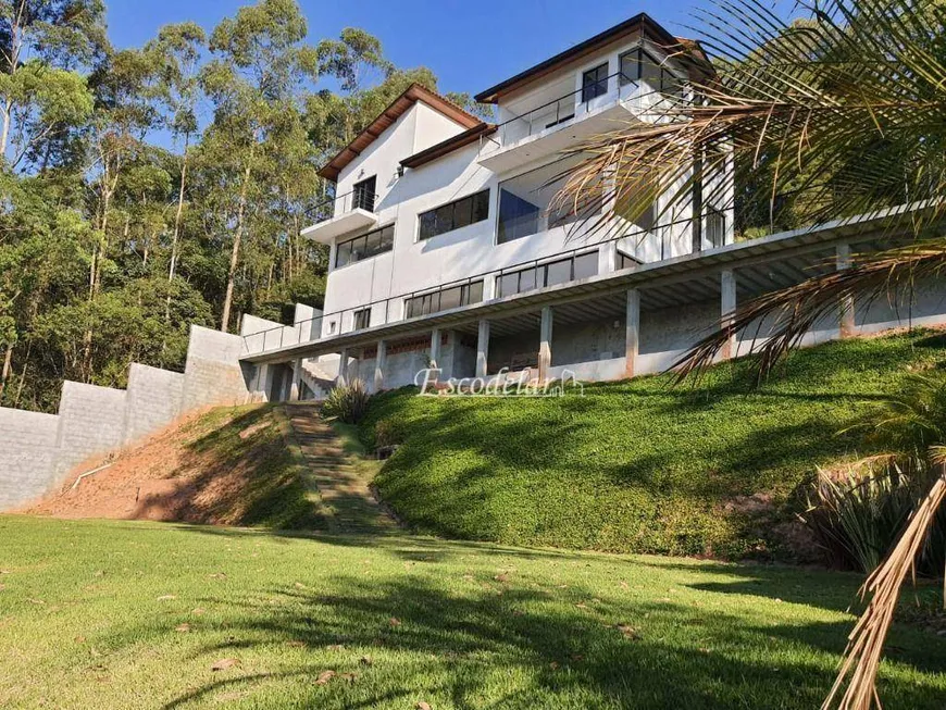 Foto 1 de Casa de Condomínio com 4 Quartos à venda, 470m² em Serra da Cantareira, Mairiporã