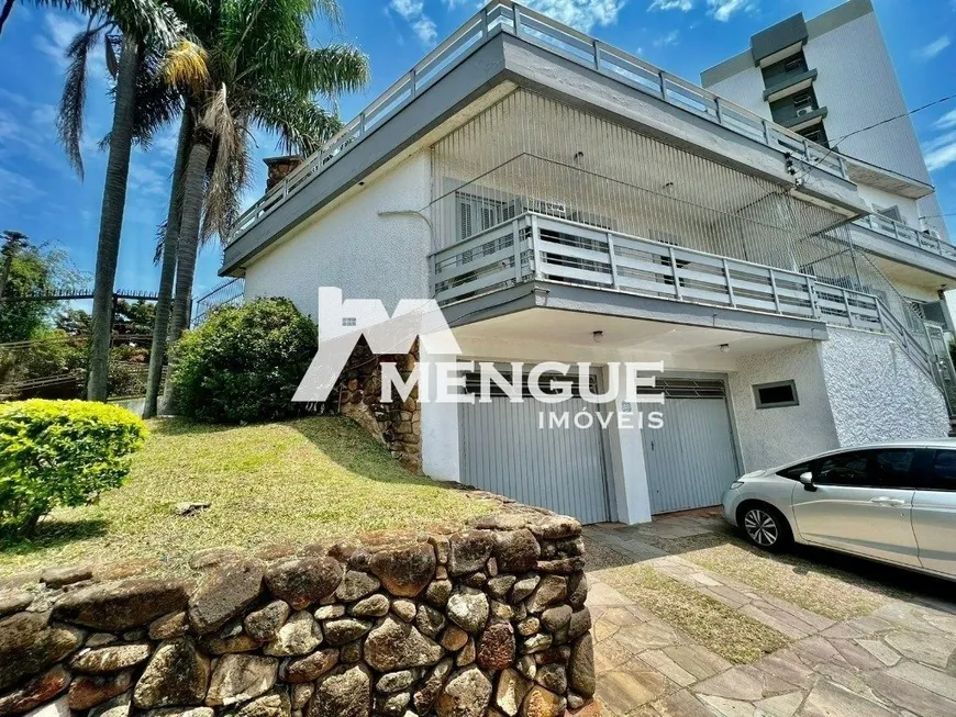 Foto 1 de Casa com 5 Quartos à venda, 241m² em Vila Ipiranga, Porto Alegre