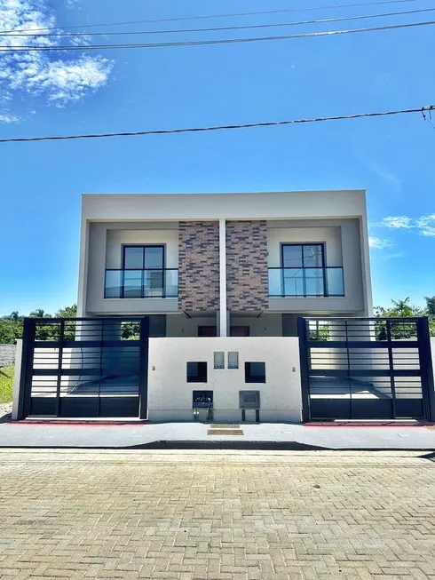 Foto 1 de Sobrado com 3 Quartos à venda, 100m² em Forquilhas, São José