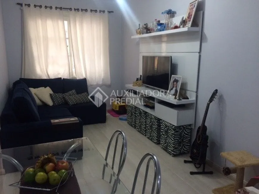 Foto 1 de Apartamento com 1 Quarto à venda, 45m² em Santo Antônio, Porto Alegre