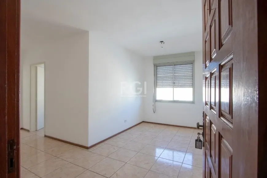 Foto 1 de Apartamento com 2 Quartos à venda, 52m² em Vila Nova, Porto Alegre