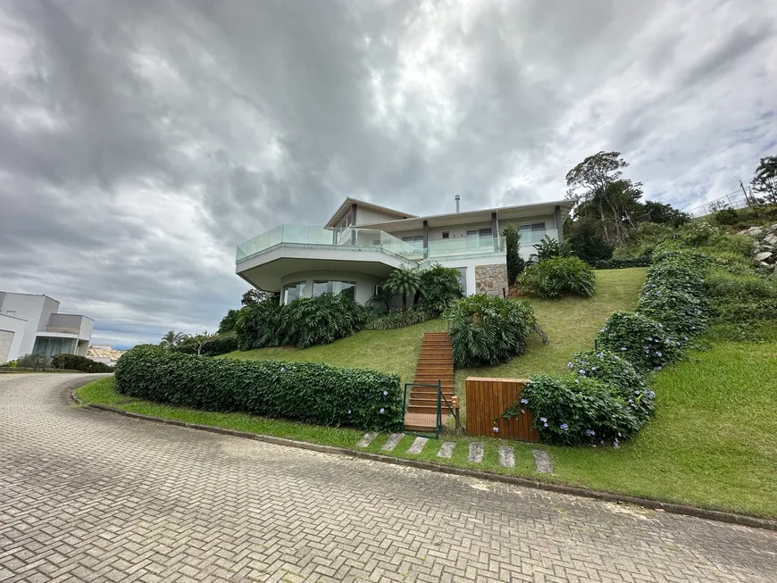 Foto 1 de Casa de Condomínio com 5 Quartos para venda ou aluguel, 1220m² em Cacupé, Florianópolis