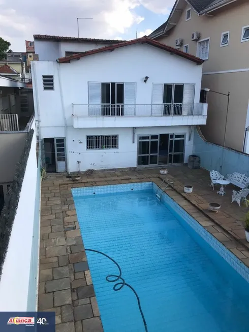 Foto 1 de Sobrado com 4 Quartos à venda, 400m² em Vila Galvão, Guarulhos