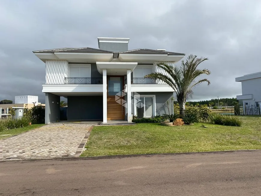 Foto 1 de Casa de Condomínio com 4 Quartos à venda, 300m² em Condominio Costa Serena, Capão da Canoa