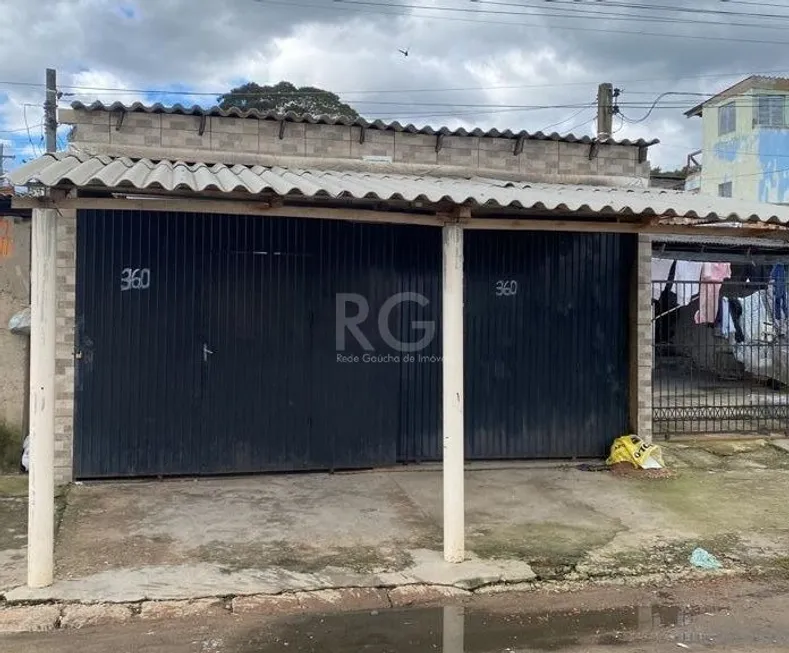 Foto 1 de Casa com 4 Quartos à venda, 149m² em Restinga, Porto Alegre