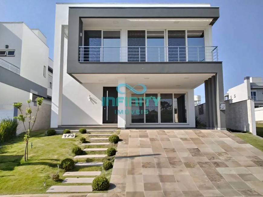 Foto 1 de Casa de Condomínio com 5 Quartos à venda, 320m² em Alphaville, Gravataí