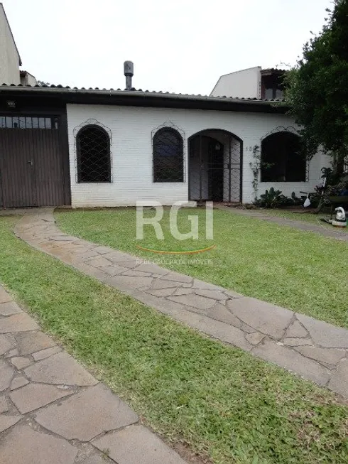Foto 1 de Casa com 3 Quartos à venda, 101m² em Guarujá, Porto Alegre